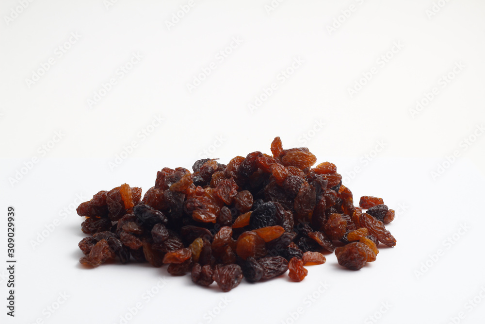 pile of raisins isolated on white background pile of raisins isolated on white background