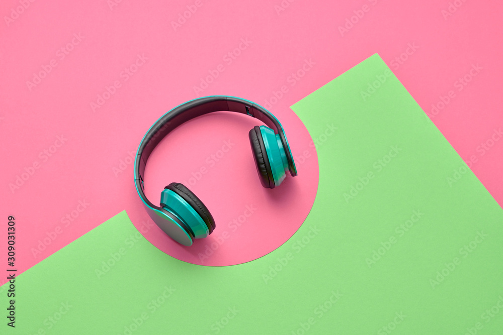 Minimal fashion, Trendy headphones. Music vibration on geometry background. Hipster DJ accessory Flat lay. Art creative summer vibes, fashionable pop art style. Sweet pink design color Minimal fashion, Trendy headphones. Music vibration on geometry background. Hipster DJ accessory Flat lay. Art creative summer vibes, fashionable pop art style. Sweet pink design color