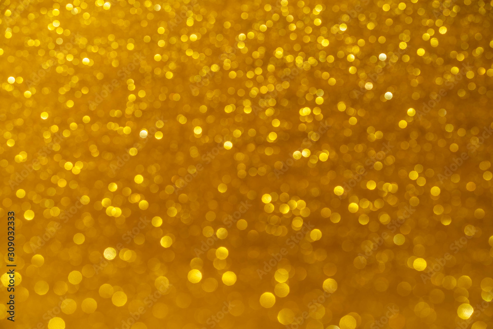 Golden beautiful festive blurred background. Concept for the holiday. Golden beautiful festive blurred background. Concept for the holiday.