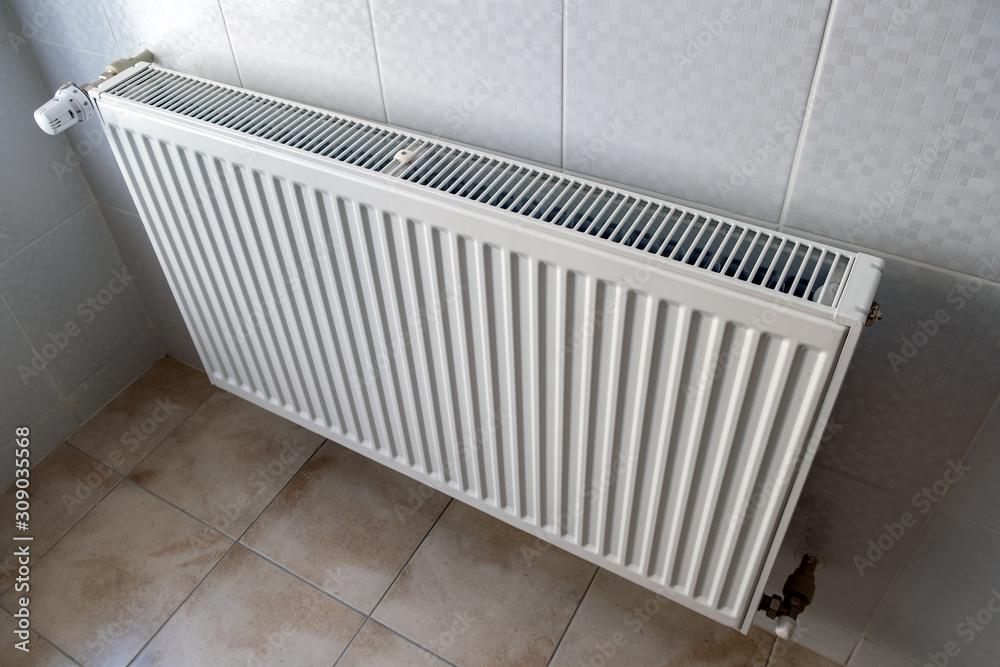 custom made wallpaper toronto digitalWhite metal heating radiator mounted on a wall in room interior.
