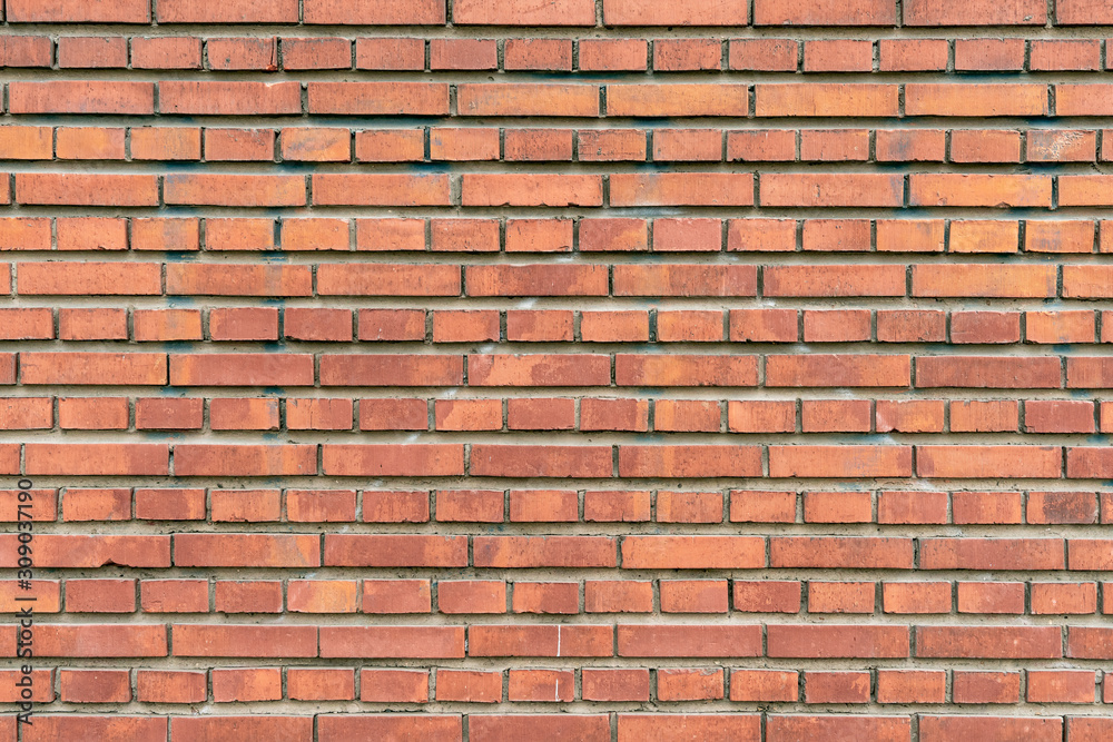 Wall texture of modern brown rough brick. Cross brickwork. Grunge surface background. Vintage orange brickwall. Wall texture of modern brown rough brick. Cross brickwork. Grunge surface background. Vintage orange brickwall.