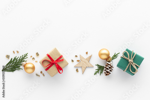 Christmas composition. Gift star bauble top view background with copy space for your text. Flat lay.