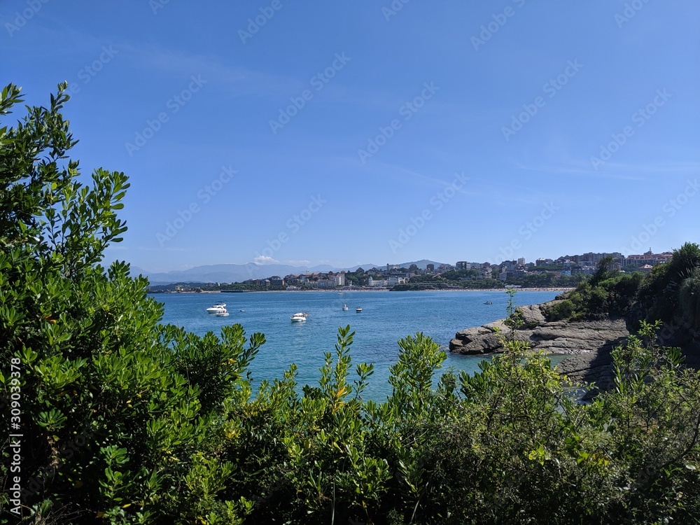 Ocean View Overlook With Boats and City Background Ocean View Overlook With Boats and City Background