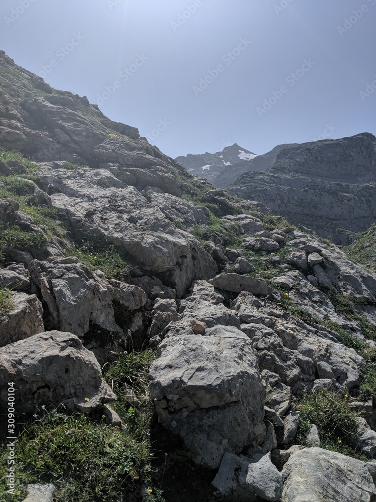 Mountains With Grass and Rocks in Spain, Los Picos de Europa, the Peaks of Europe Mountains With Grass and Rocks in Spain, Los Picos de Europa, the Peaks of Europe