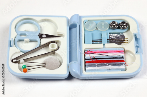 travel or multi-purpose sewing kit on white background