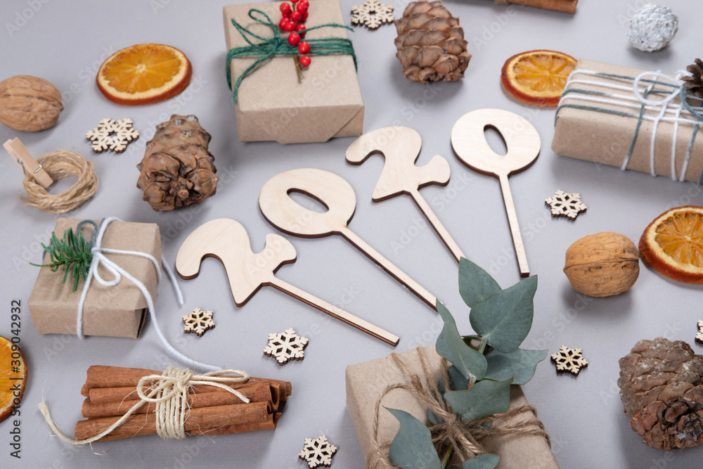 Naklejka premium Beautiful, natural and zero waste New Year composition of decoration objects.