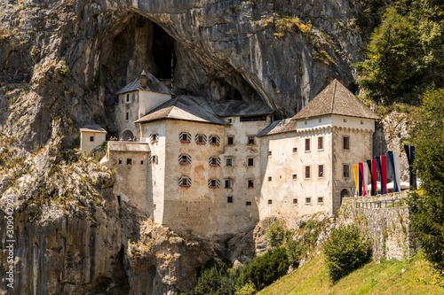 Predjama, Slovenia. The Predjamski Grad or Predjama Castle, a Renaissance fortress near Postojna in the mouth of a cave photo