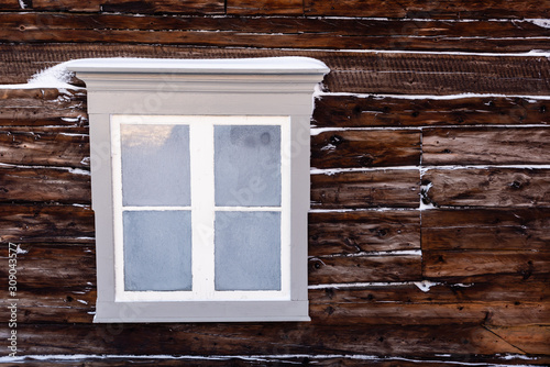 frozen window with ice and snow left