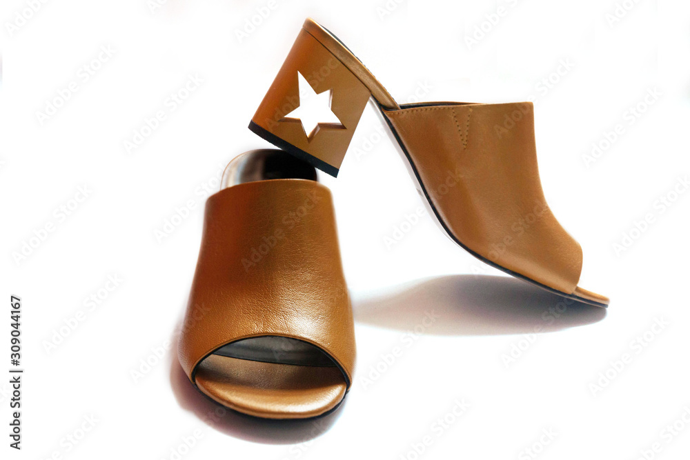 shoes gold open-toed heels with a hole in the form of a star, isolate shoes gold open-toed heels with a hole in the form of a star, isolate