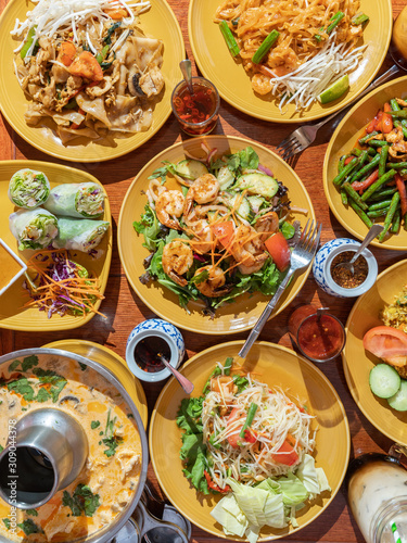 Authentic Thai cuisine. Spicy and pungent Asian food such as papaya salad, tom yum soup, shrimp prawn pad thai, and chicken drunken noodles.