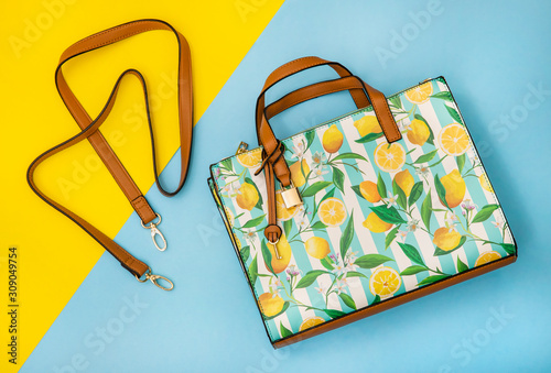 flat lay of fashion lemon purse