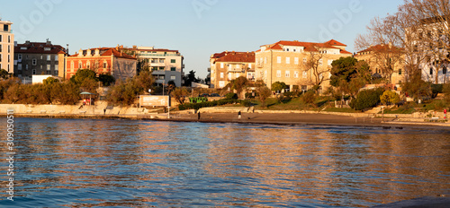 Fototapeta Naklejka Na Ścianę i Meble -  Croatian sandy beach of Bacvice shot from a nearby hill. Most popular beach in town