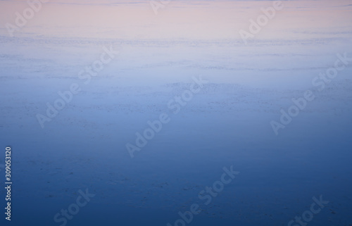 Frozen lake at sunset gradient spectrum