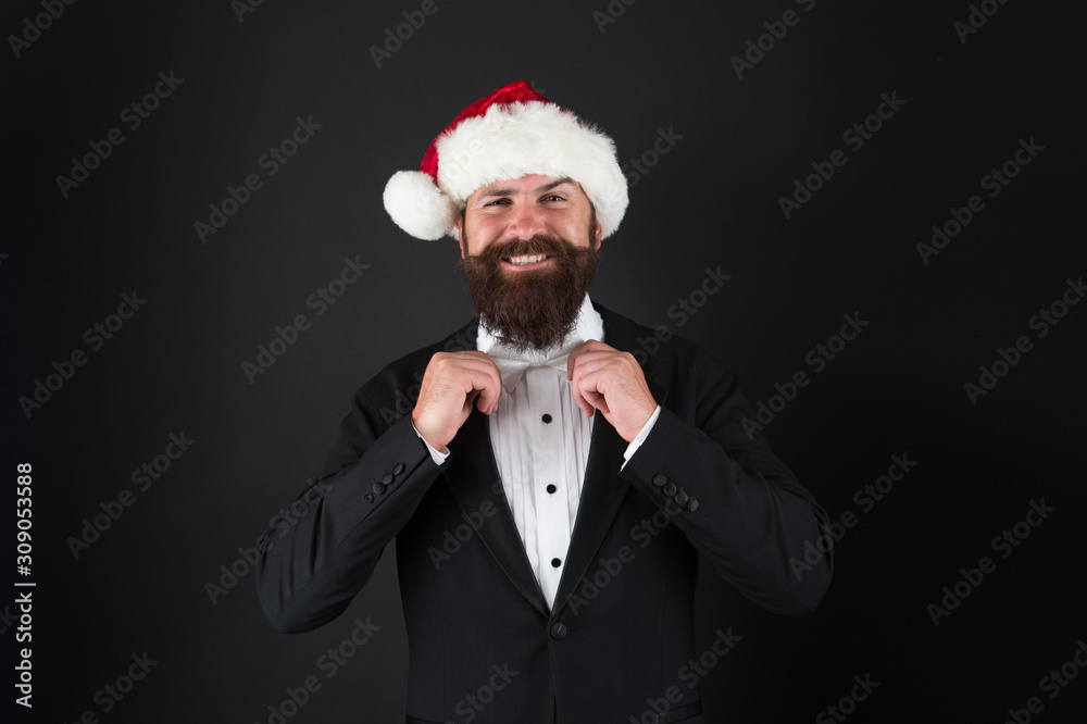 Take fashion look at xmas tradition. Happy businessman fix bow tie. Bearded man feel like Santa in classy fashion style. Christmas party costumes and fashion accessories. Christmas style and fashion Take fashion look at xmas tradition. Happy businessman fix bow tie. Bearded man feel like Santa in classy fashion style. Christmas party costumes and fashion accessories. Christmas style and fashion