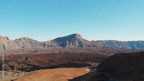 Aerial view - Teide National Park, desert, frozen lava and high mountains, the foot of the volcano