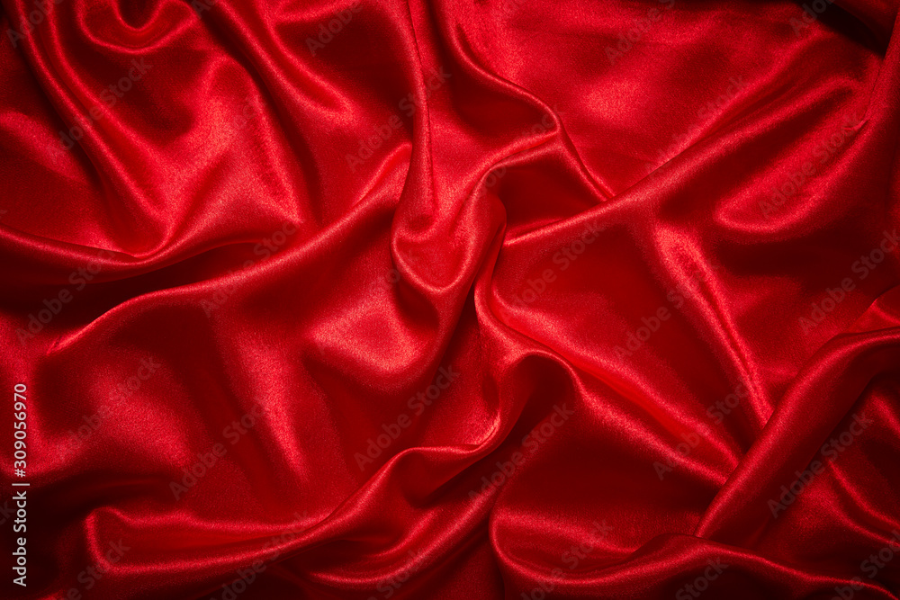 Luxury red satin smooth fabric background for celebration, ceremony, event invitation card or advertising poster Luxury red satin smooth fabric background for celebration, ceremony, event invitation card or advertising poster