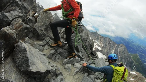 Men are climbing to the top of the mountain. Mount Blanc Mountain. Alps