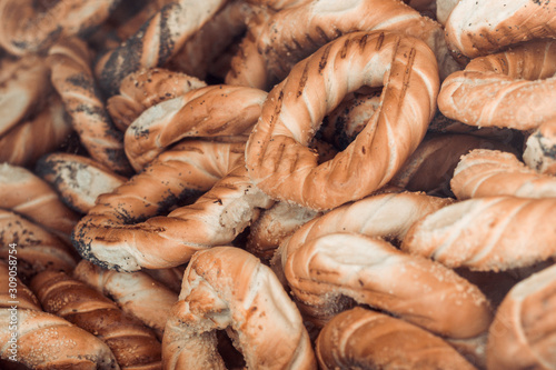 Variety of fresh bagels. Turkish fast food bagel called Simit. Bagel is traditional Cracow bakery food