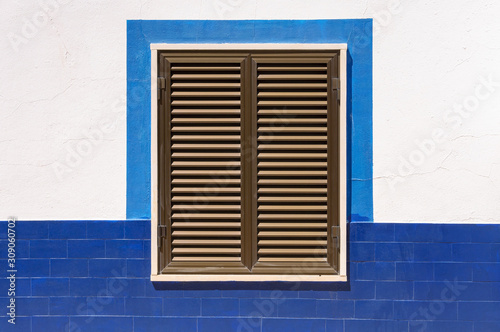 Closed window shutters of an mediterranean house