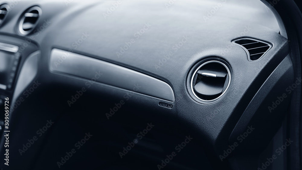 Air conditioner system in modern car, closeup. Air duct grille of modern car.