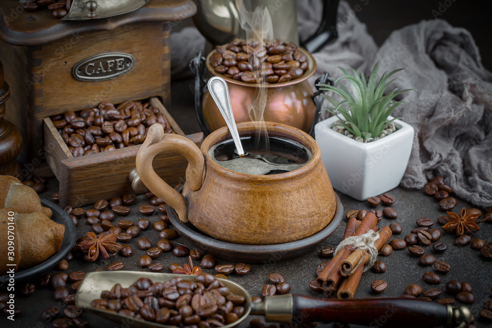 Black coffee on an old background in a cup Black coffee on an old background in a cup