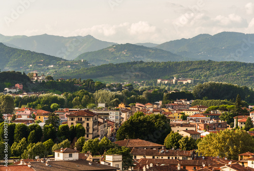 View at traditional ancient Italian town with colorful houses in Tuscany from above