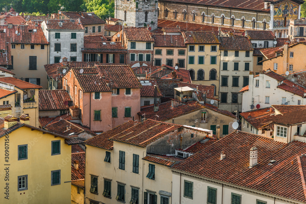 View at traditional ancient Italian town with colorful houses in Tuscany from above