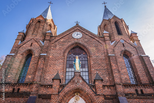 Front facade of St Margaret Church in Leoncin village in Masovia region of Poland photo