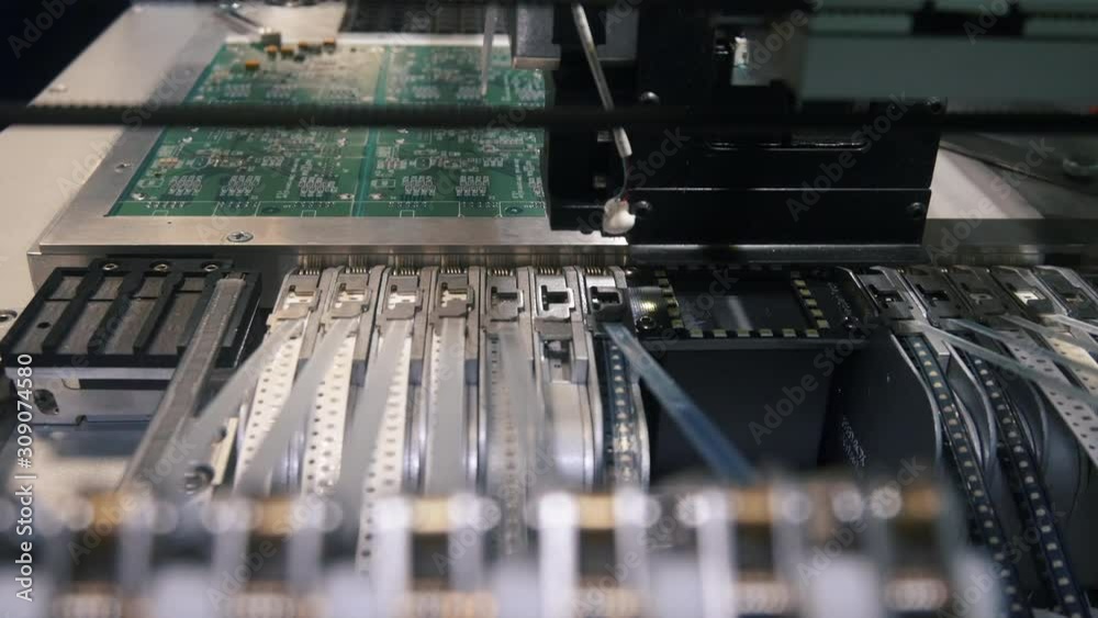 Computer microchip manufacturing on modern industrial equipment Computer microchip manufacturing on modern industrial equipment