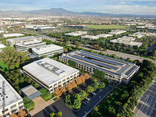 Aerial view of business and finance district with new office building surrounded by parking and road. Irvine Business Complex. Irvine California. USA photo