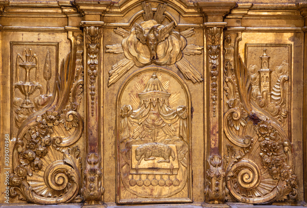 ZARAGOZA, SPAIN - MARCH 3, 2018: The polychome carved broque tabernacle from side altar in church  Iglesia de San Miguel de los Navarros.