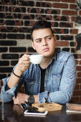 young man in a coffee shop 