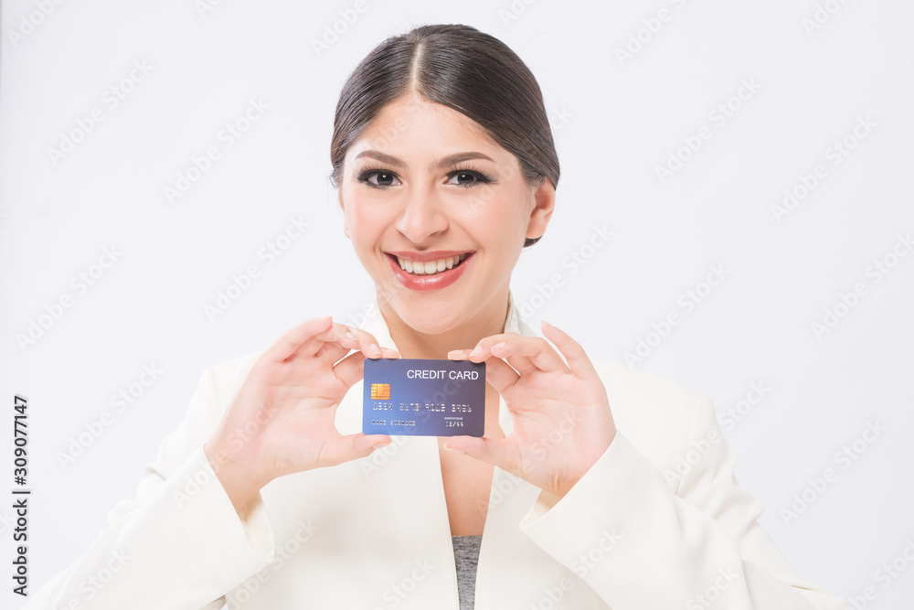 young smiling beautiful asian woman presenting credit card in hand young smiling beautiful asian woman presenting credit card in hand
