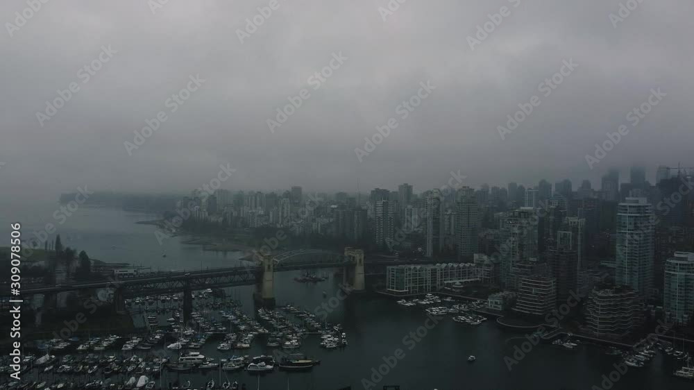 Establishing aerial view of Burrard Bridge with the West Vancouver on the background. Establishing aerial view of Burrard Bridge with the West Vancouver on the background.