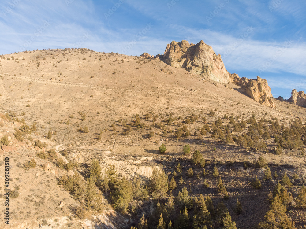 Rocks in a beautifully beautiful desert canyon. Smith Rock State Park National Park. Oregon State. Top view Rocks in a beautifully beautiful desert canyon. Smith Rock State Park National Park. Oregon State. Top view