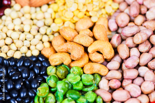 Collage various beans mix peas agriculture of natural healthy food for cooking ingredients Set of different whole grains beans and legumes seeds lentils and nuts colorful snack texture background