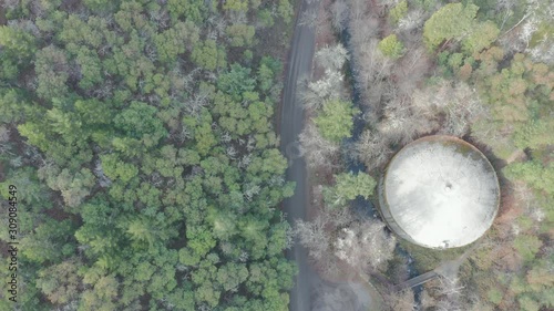 4k Aerial View Looking Up From Water Tank to Luxury Houses on a Hill in Ashland photo