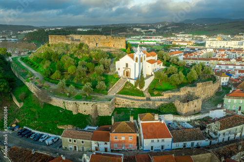 Aerial panorama of the medieval castle with Moorish origins in Torres Vedras Portugal with restored castle church and keep