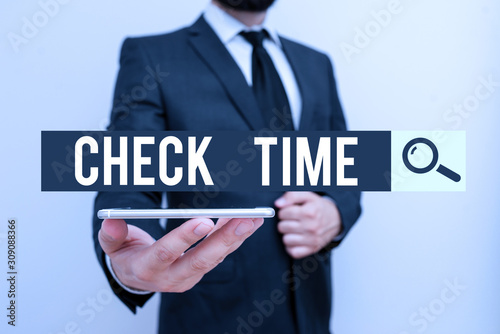 Handwriting text Check Time. Conceptual photo instance of checking the time taken to cover a specific distance Male human wear formal work suit hold smart hi tech smartphone use one hand