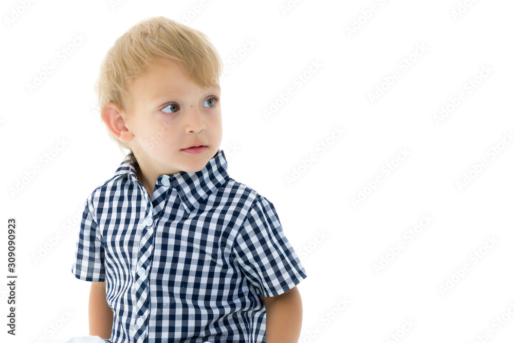 Little boy is playing with a soccer ball. Little boy is playing with a soccer ball.