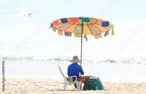young couple on the beach © korn
