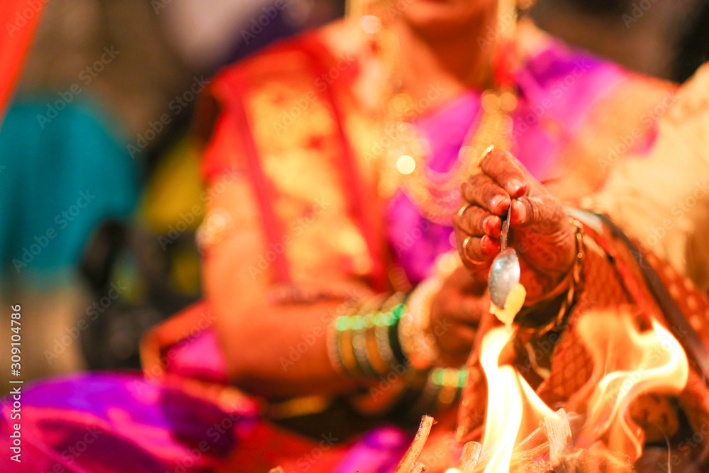Indian wedding ceremony : groom and bridal hand 