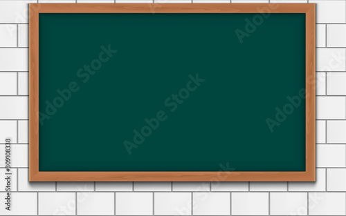 green board on the white block wall