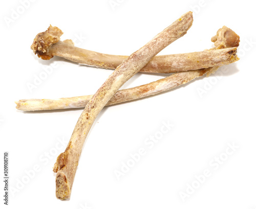 Animal ribs bones isolated on white background. leftover food closeup photo