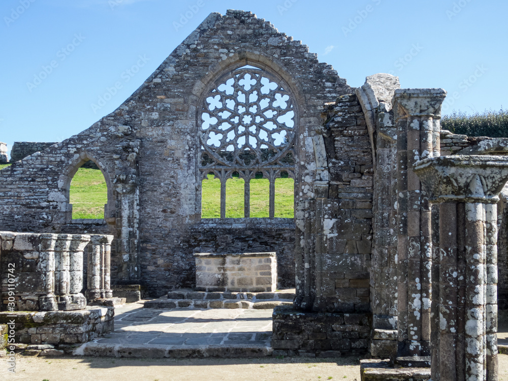 Ruins of the Capel of Languidou, in Plovan, Brittany, France.  The apse and the rose window.