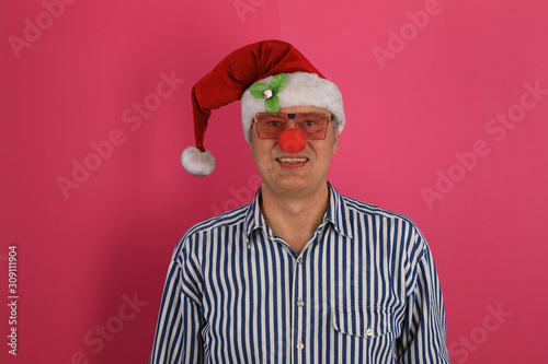 Close-up male christmas portrait with christmas hat