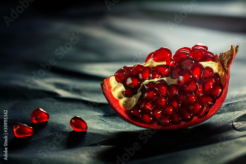 Pieces of ripe pomegranate fruit close-up