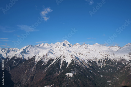 Panoramic aerial view of Brenta Dolomites, Italy, snow on the slopes of the Alps Madonna di Campiglio, Pinzolo, Italy. The most popular ski resorts in Italy. Aerial photography with drone
