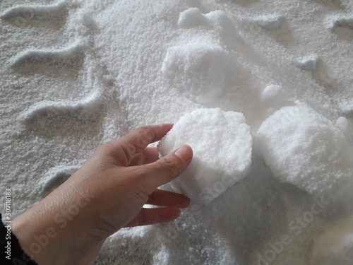 Urea chemical fertilizer, white foam granules, agglomerate In the hands of farmers