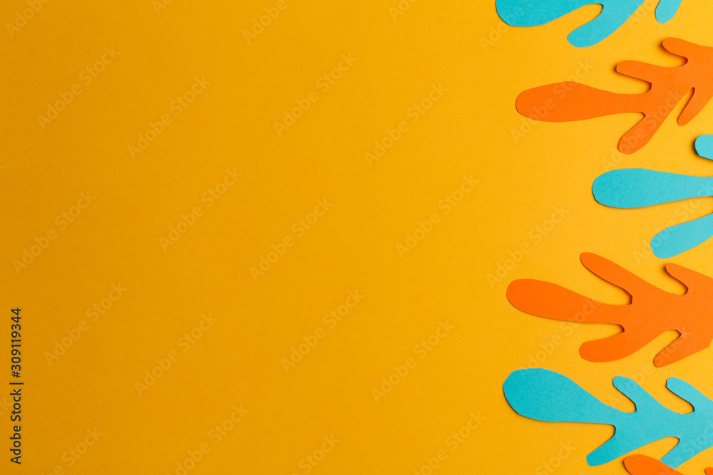 Fototapeta premium orange background of paper orange and blue abstraction, handmade